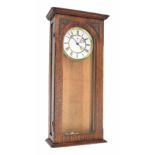 Interesting electric Vienna style wall clock, the 6.25" white dial enclosing a recessed centre