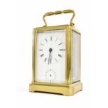 Carriage clock timepiece with alarm striking on a bell, within a corniche style brass case, 5.75"