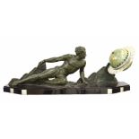 Large impressive Art Deco patinated spelter and black marble figural electric globe clock, the world