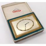 Omega 8 days gilt metal desk clock, the 5'' signed rectangular silvered dial with Roman numeral