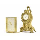 Small gilt metal balloon mantel clock timepiece, the 2.25" white dial within a pierced rococo