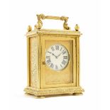 Unusual heavy gilt brass carriage clock timepiece, the 1.75" cream dial within a fine foliate