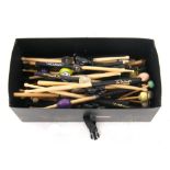 Flight box containing a selection of sticks and mallets, many adapted with castanets, shakers and