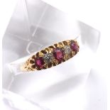 18ct claw set ruby and diamond five stone ring, with three round rubies and two old-cut diamonds,