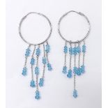 Pair of 18k white gold hoop earrings, each with five blue topaz drops, 13gm, drop 100mm