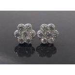 Pair of 18k white gold diamond cluster earrings, round brilliant-cut, 2.25ct approx, clarity SI1-