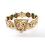 Antique gold diamond set circular disc link bracelet, the centre disc modelled with a lion's head