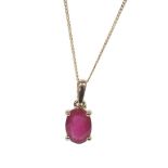 9ct ruby solitaire oval-cut pendant on a slender necklace, the pendant 13mm x 6mm