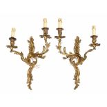 Pair of French rococo style ormolu twin sconce wall lights, of foliate form, 21" high (2)