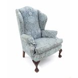 Good modern blue upholstered wing armchair in the Georgian manner, with carved detail ball and