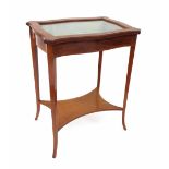 Edwardian mahogany inlaid two-tier vitrine cabinet, the serpentine glazed top enclosing a velvet