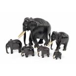 Group of six ebonised hardwood Indian elephant figures, tallest 7" high (6)