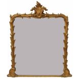Victorian carved giltwood overmantel mirror, with a carved sheathed foliate frame, 54.5" x 49"