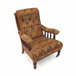 Late Victorian deep button-back upholstered walnut armchair, the velvet upholstered back and