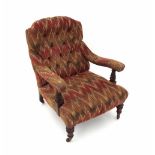 Late Victorian upholstered armchair, the button-back and padded arms with turned supports and