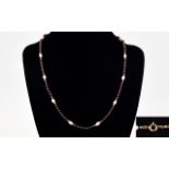 A Nice Quality Ruby and Pearl Set Neckla
