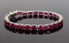 Ruby Tennis Bracelet, 28cts of oval cut,