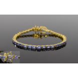 Tanzanite Tennis Bracelet, an oval cut l