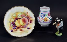 A Small Collection Of Ceramic Items Thre