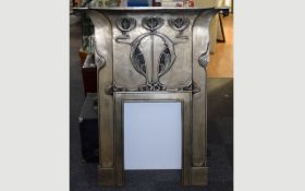 A Reproduction Art Nouveau Cast Iron Fire Surround Highly stylised fire surround with pewter tone