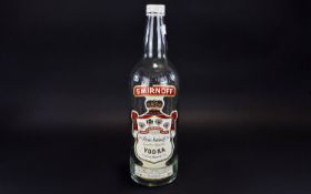 A Vintage 3 Litre Collectible Smirnoff Vodka Bottle Complete with original screw cap and label.