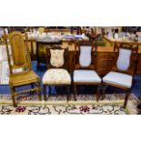 A Collection Of Four Dining Chairs To include two carved back dining chairs with blue jacquard