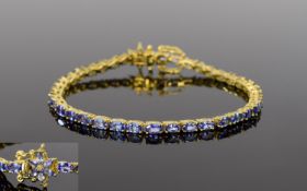 Tanzanite Tennis Bracelet, an oval cut line of the rare, single source gemstone, tanzanite,