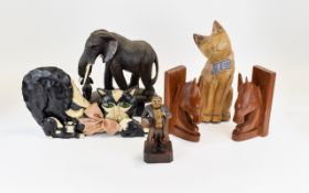 A Collection Of Carved Wooden Animal Figures.