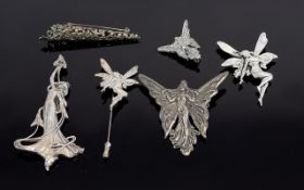 A Collection Of Silver Tone Fairy Interest Brooches Six items in total to include reproduction Art