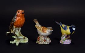 Three Pottery Bird Figures Comprising Royal Worcester Sparrow & Great Tit And A Goebel Robin