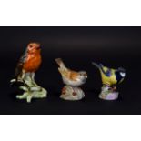 Three Pottery Bird Figures Comprising Royal Worcester Sparrow & Great Tit And A Goebel Robin