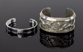 Silver African Inspired Cuff And Silver Tone Statement Cuff Two items in total,