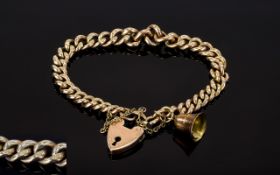 Antique Rose Gold Curb Bracelet with Heart Shaped Padlock and Charm In The Form of a Bell.