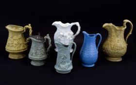 A Good Collection of Mid 19th Century Moulded Jugs with High Relief Decoration to Bodies ( 6 ) Six