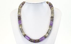 Anne Farag Amethyst and Silver Necklace, artisan designer necklace of tubular and rondelle
