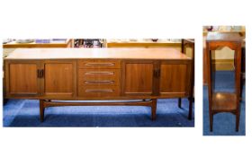 A Large G Plan Sideboard Low side board in Teakwood with two double door cupboards and four central