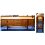 A Large G Plan Sideboard Low side board in Teakwood with two double door cupboards and four central