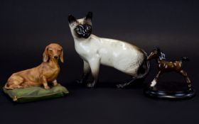 Beswick Siamese Cat Together With A Doulton Foul And A Capodimonte Dachshund