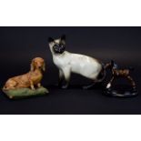 Beswick Siamese Cat Together With A Doulton Foul And A Capodimonte Dachshund