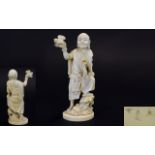 Japanese - Signed Late 19th Century Carved Ivory Figure of a Japanese Male In a Standing Position,