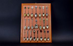 A collection Of Decorative Teaspoons, 26 in total from various locations.