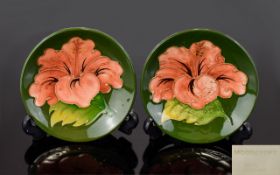 Moorcroft Pair of Tube lined Pin Dishes ' Coral Hibiscus ' Design on Green Ground. c.1980's. Each 4.
