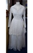 Vintage Wedding Dress An ivory wedding dress in the romantic revival style.