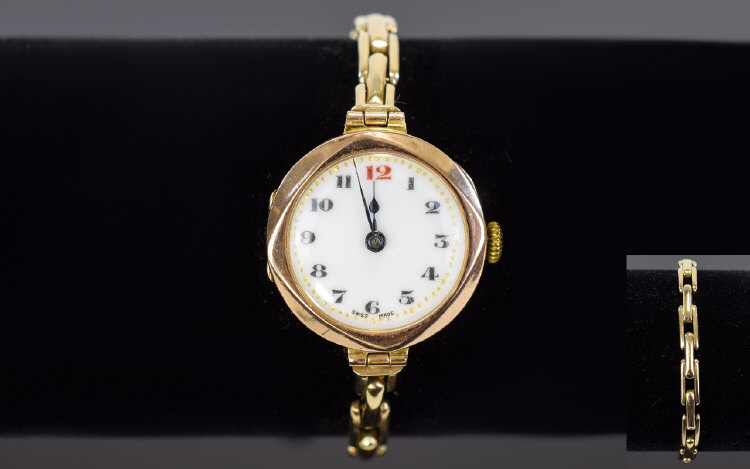 Ladies Swiss Made - Mechanical 9ct Gold Case Watch with Integral 9ct Gold Expanding Bracelet.