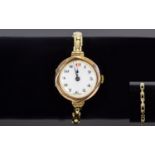Ladies Swiss Made - Mechanical 9ct Gold Case Watch with Integral 9ct Gold Expanding Bracelet.