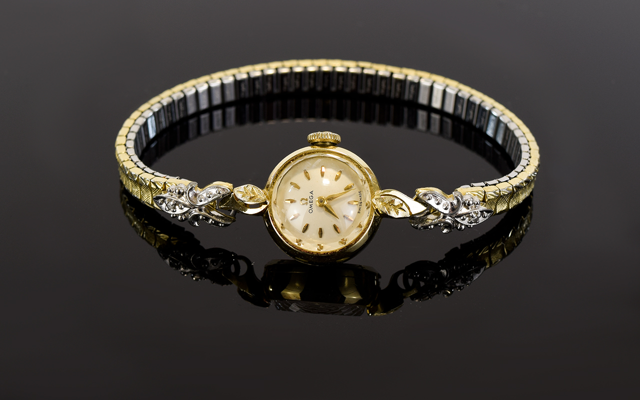 Omega 9ct Gold Cased Mechanical 1960's Period Ladies Wrist Watch on Gold Plated Bracelet.