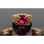 18ct Gold Set Single Stone Ruby Ring. In a Gypsy Setting. The Ruby of Excellent Pigeon Blood Colour.