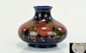 William Moorcroft Signed Large Onion Shaped Vase ' Pomegranates and Berries ' on Blue Ground,