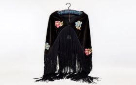 A Vintage Embroidered Velvet Shawl Small shoulder wrap in black velvet with long black fringing