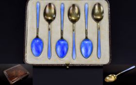 A Fine Set of Six Silver and Enamel Teaspoons. Boxed.